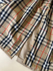 Trench color sabbia con fodera tartan “Idrostop”