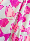 Abito in cotone carta da zucchero con maxi fiocchi rosa 