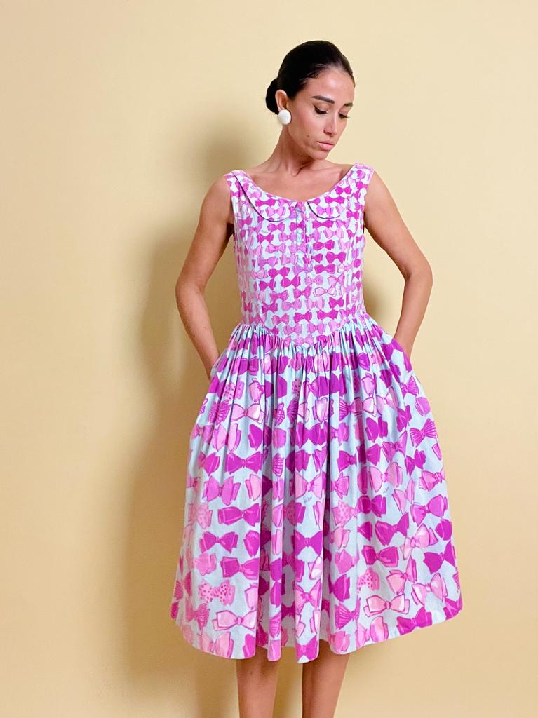 Abito in cotone carta da zucchero con maxi fiocchi rosa 
