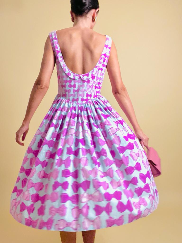 Abito in cotone carta da zucchero con maxi fiocchi rosa 