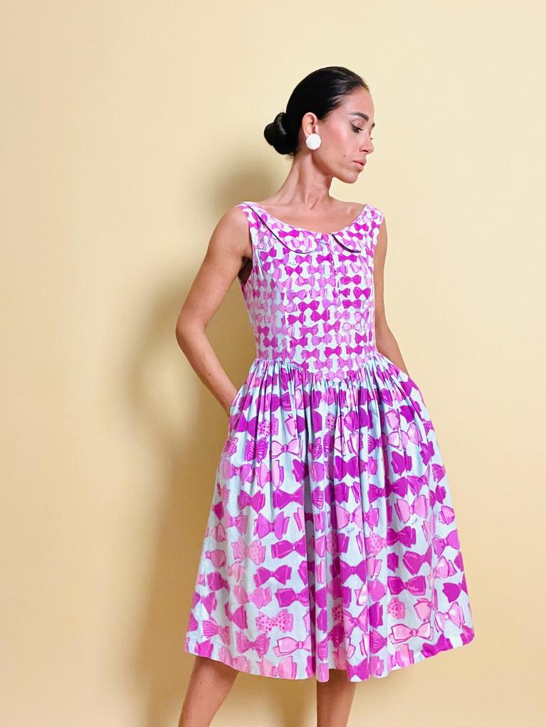 Abito in cotone carta da zucchero con maxi fiocchi rosa 