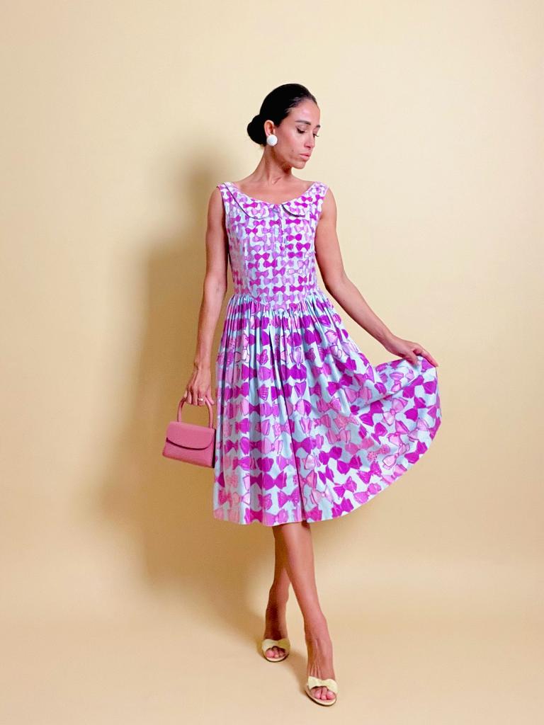 Abito in cotone carta da zucchero con maxi fiocchi rosa 