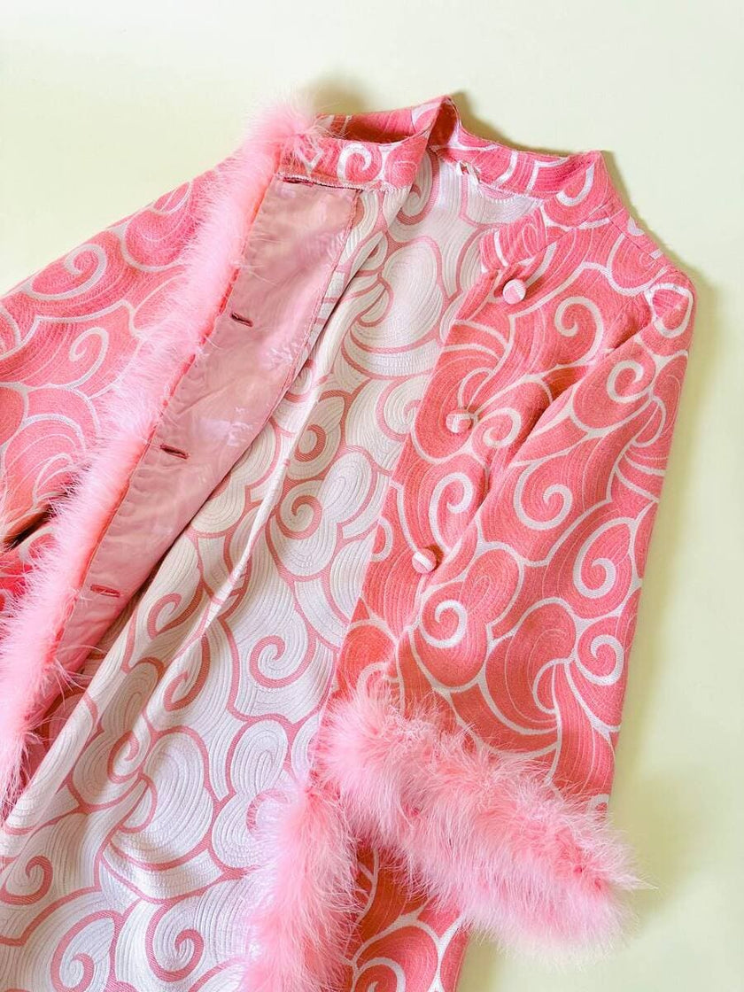 Abito in tessuto Jacquard rosa profilato con marabù in tinta