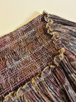 Abito lungo in lurex micro plissé fantasia florale
