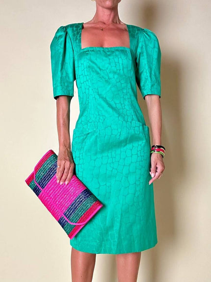 Abito verde smeraldo con abbottonatura posteriore “Yves Saint Laurent”