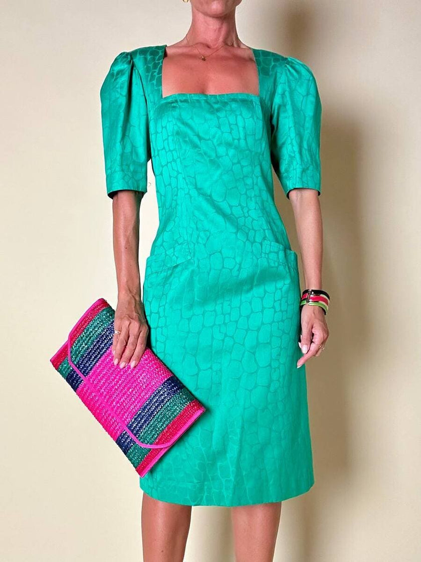 Abito verde smeraldo con abbottonatura posteriore “Yves Saint Laurent”