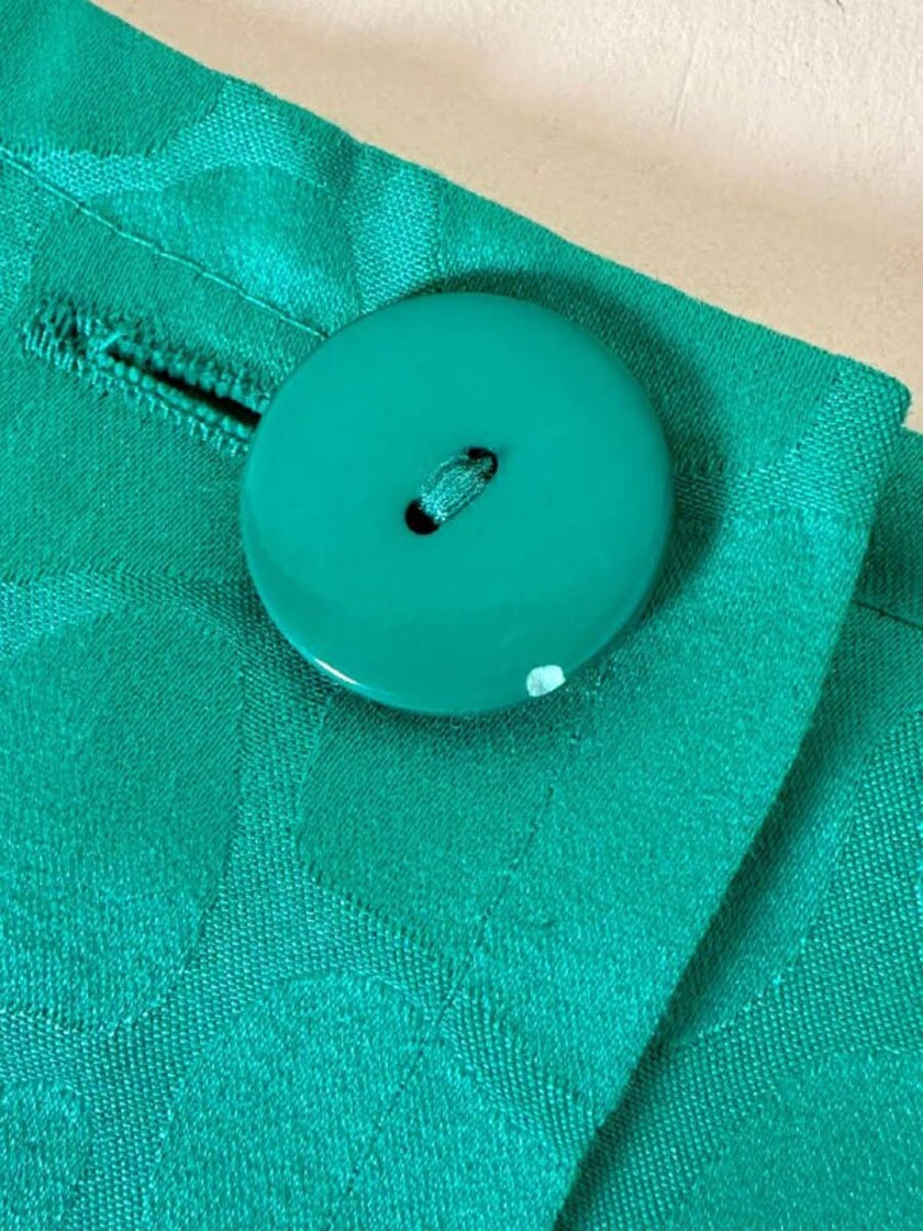 Abito verde smeraldo con abbottonatura posteriore “Yves Saint Laurent”
