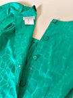 Abito verde smeraldo con abbottonatura posteriore “Yves Saint Laurent”