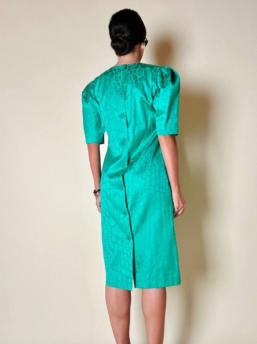 Abito verde smeraldo con abbottonatura posteriore “Yves Saint Laurent”