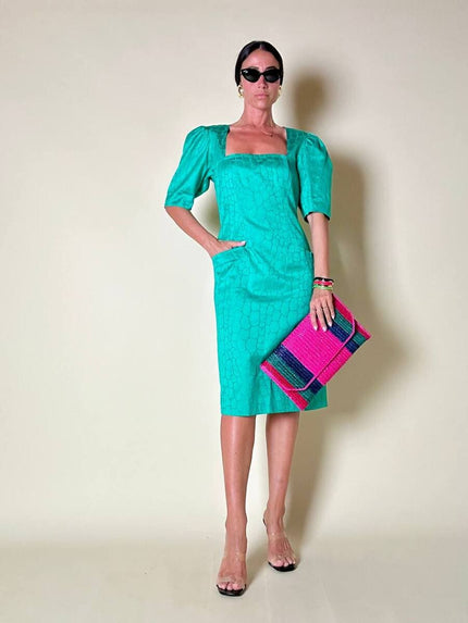 Abito verde smeraldo con abbottonatura posteriore “Yves Saint Laurent”