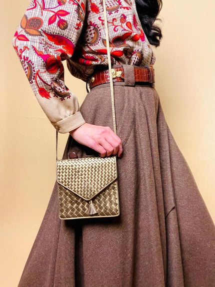 Bandolier in pelle intrecciata color bronzo 