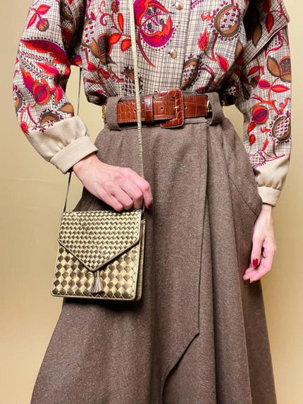 Bandolier in pelle intrecciata color bronzo 