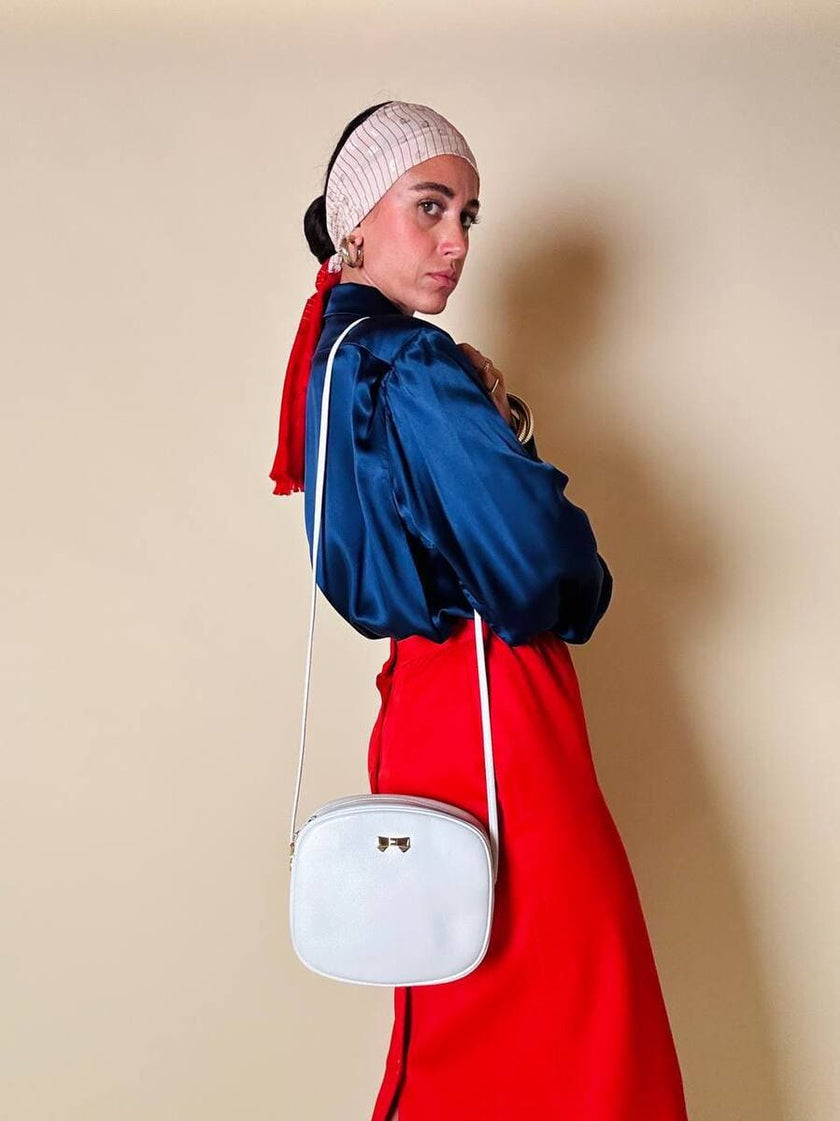 Bandolier vintage Nina Ricci in pelle Bianca con hardware oro
