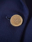 Blazer doppiopetto blu con bottoni dorati “Yves Saint Laurent”