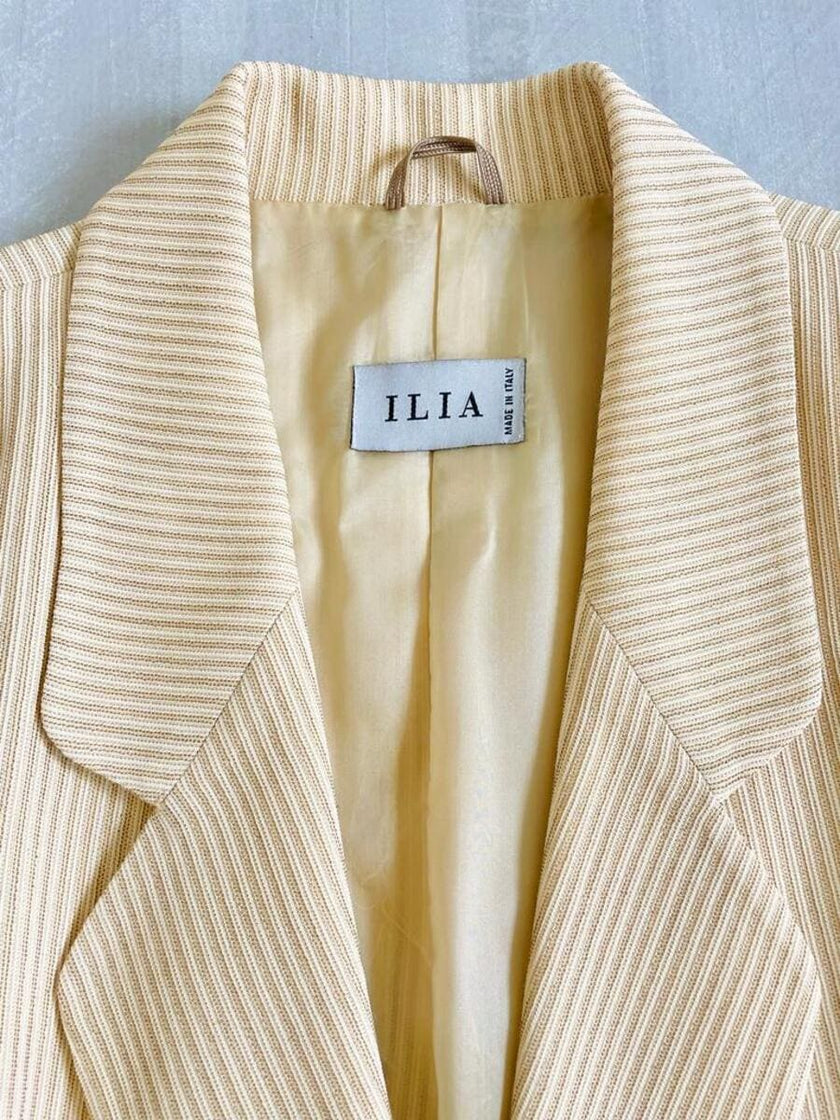 Blazer color panna in tessuto canneté