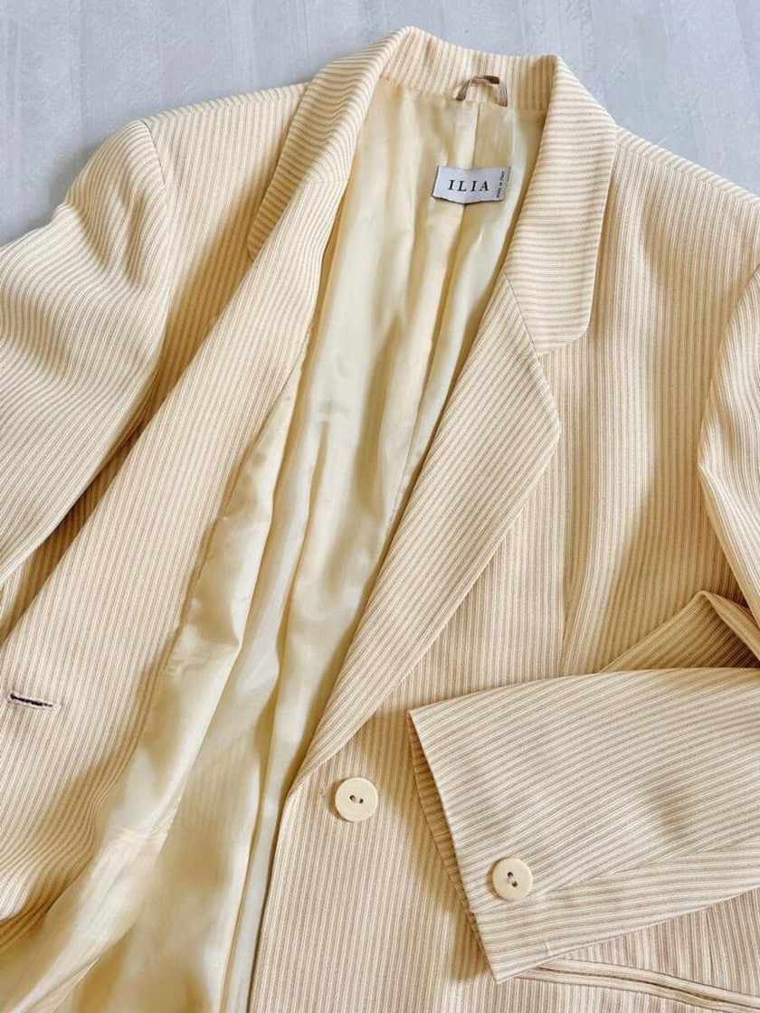 Blazer color panna in tessuto canneté