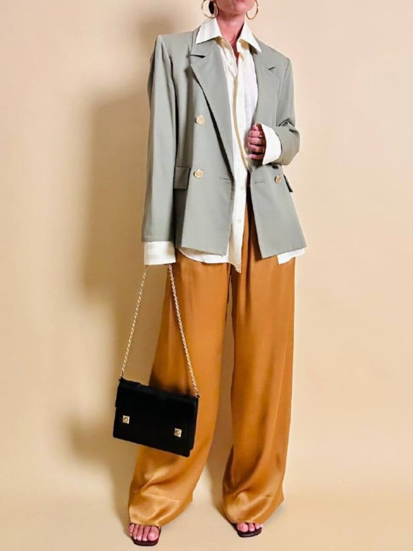 Pantalone a palazzo in cady lucido color ambra 