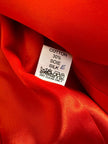Blazer in shantung turchese con bottoni rossi a forma di cuore 