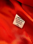 Blazer in shantung turchese con bottoni rossi a forma di cuore 