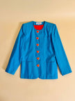 Blazer in shantung turchese con bottoni rossi a forma di cuore 