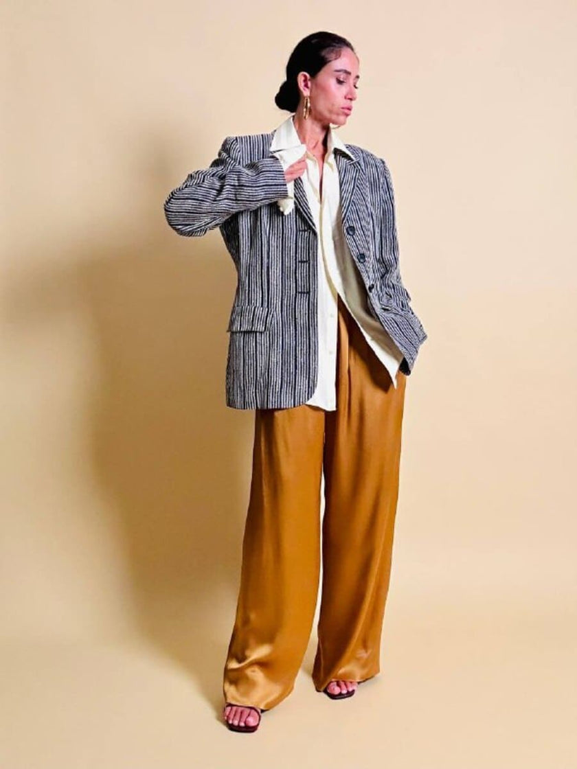 Pantalone a palazzo in cady lucido color ambra 