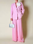 Blazer rosa con bottone gioiello in madreperla “Yves Saint Laurent”