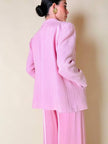 Blazer rosa con bottone gioiello in madreperla “Yves Saint Laurent”
