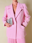 Blazer rosa con bottone gioiello in madreperla “Yves Saint Laurent”