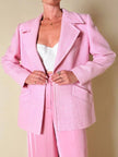 Blazer rosa con bottone gioiello in madreperla “Yves Saint Laurent”