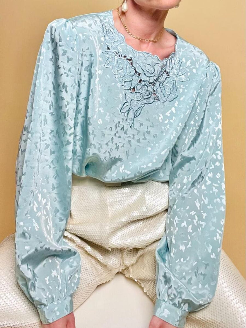 Blusa in tessuto Jaquard acqua marina con ricami floreali