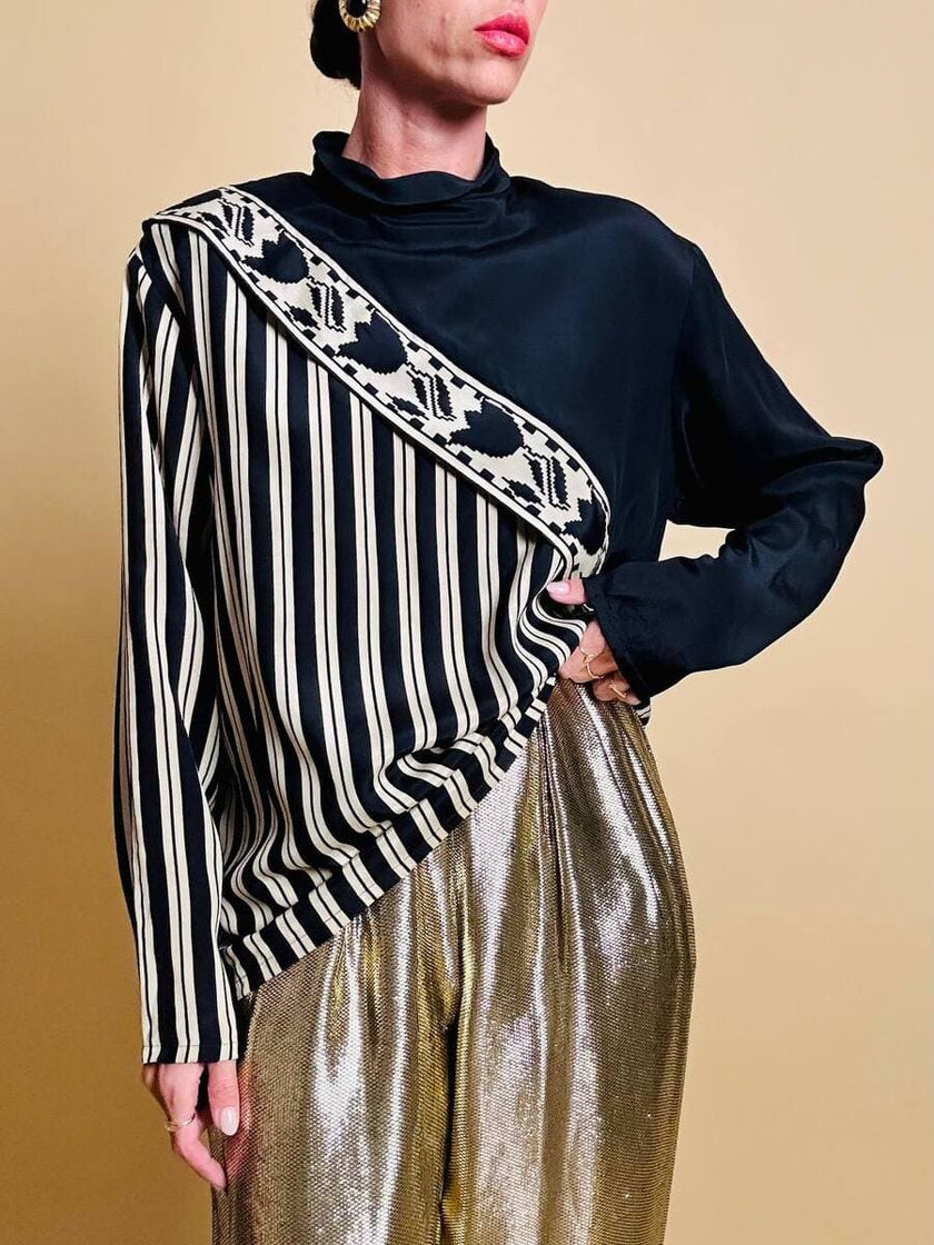 Blusa con taglio asimmetrico a righe beige e nere 