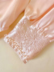 Blusa in raso di seta rosa pastello con ricamo pampino e micro perle “Paul Alexander”