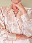 Blusa in raso di seta rosa pastello con ricamo pampino e micro perle “Paul Alexander”