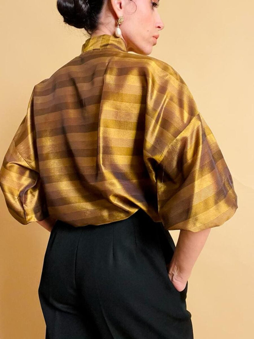 Puffy blouse in seta color ambra con maxi fiocco