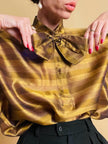 Puffy blouse in seta color ambra con maxi fiocco