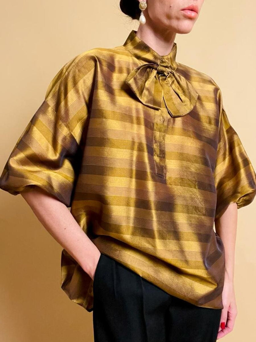 Puffy blouse in seta color ambra con maxi fiocco