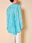 Blouse cape en soie Jacquard aigue-marine « Vizio »