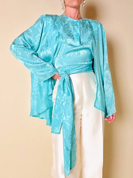 Blusa a mantella in seta Jacquard acquamarina “Vizio”