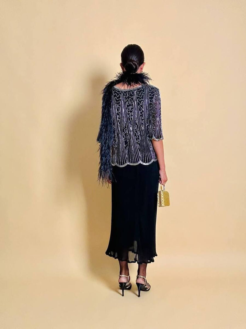 Blusa nera in chiffon di seta ricamata con perline silver