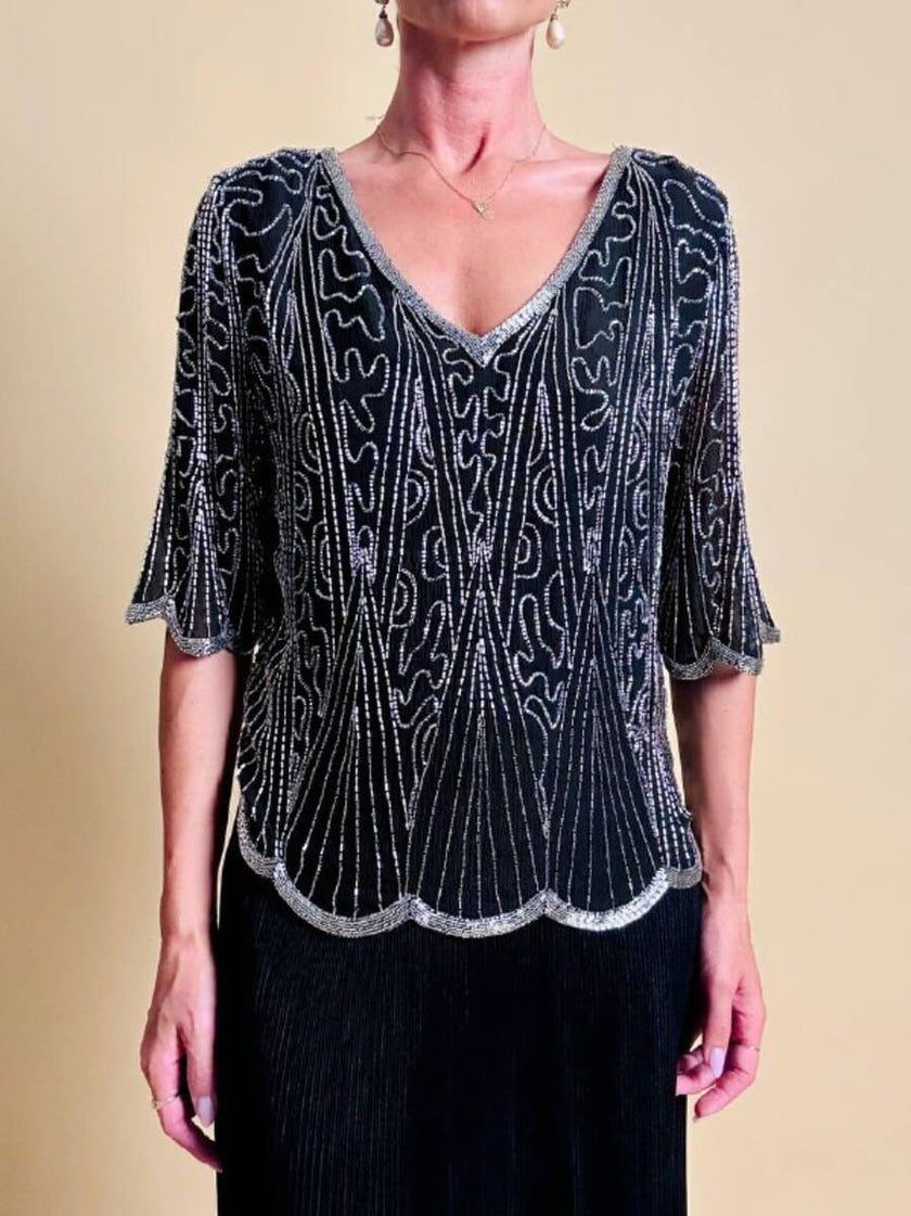 Blusa nera in chiffon di seta ricamata con perline silver
