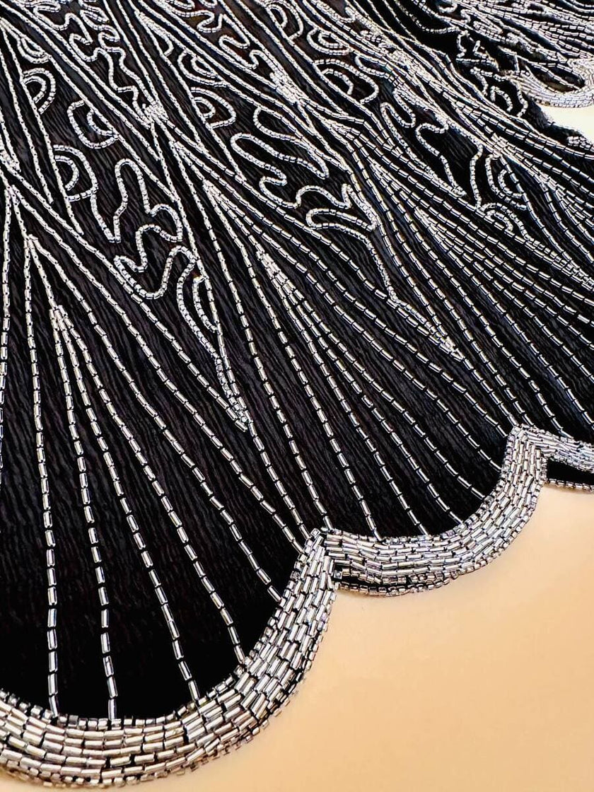 Blusa nera in chiffon di seta ricamata con perline silver