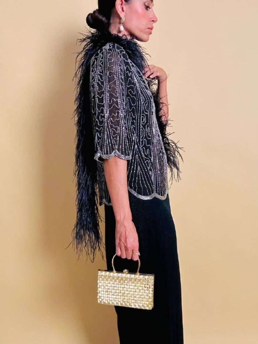 Blusa nera in chiffon di seta ricamata con perline silver