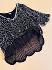 Blusa nera in chiffon di seta ricamata con perline silver