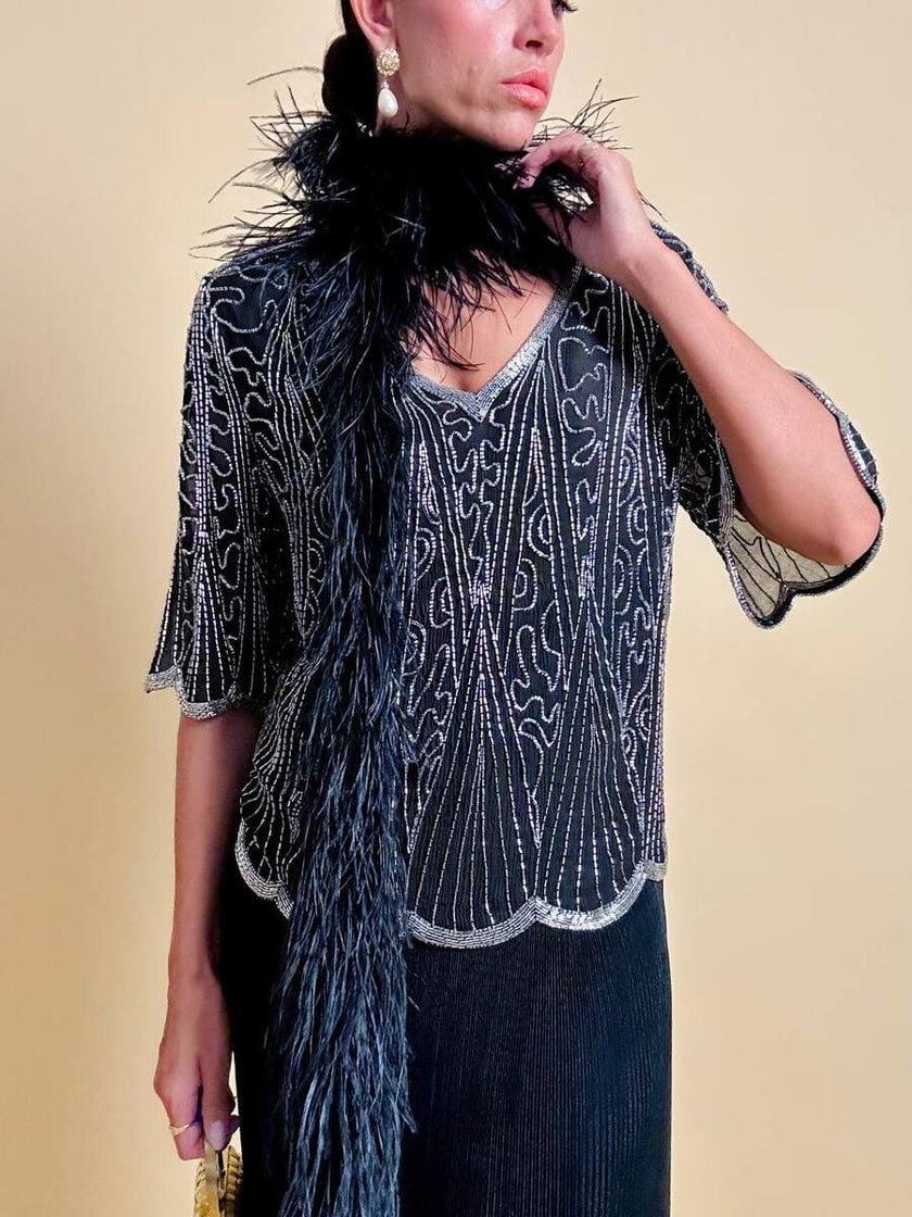 Blusa nera in chiffon di seta ricamata con perline silver