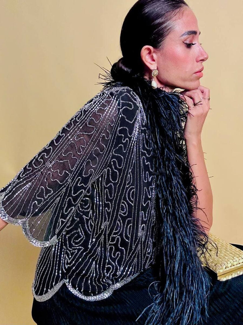 Blusa nera in chiffon di seta ricamata con perline silver