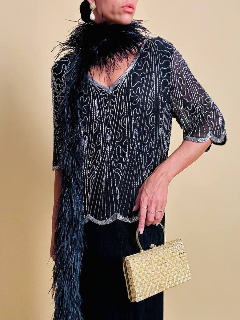 Blusa nera in chiffon di seta ricamata con perline silver
