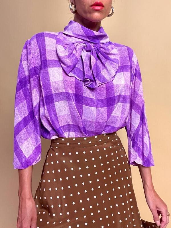 Blusa in seta lilla con maxi fiocco