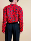 Bolero in tessuto lucido nero con ricamo floreale rosso