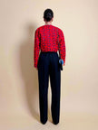 Bolero in tessuto lucido nero con ricamo floreale rosso
