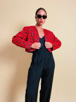 Bolero in tessuto lucido nero con ricamo floreale rosso
